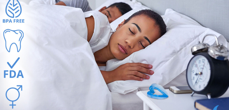 couple peacefully slepping with ZQuiet anti snoring blue mouthguard